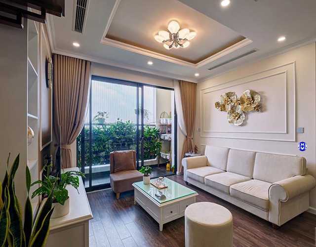 Một mẫu rèm màu kem phòng khách được yêu thích