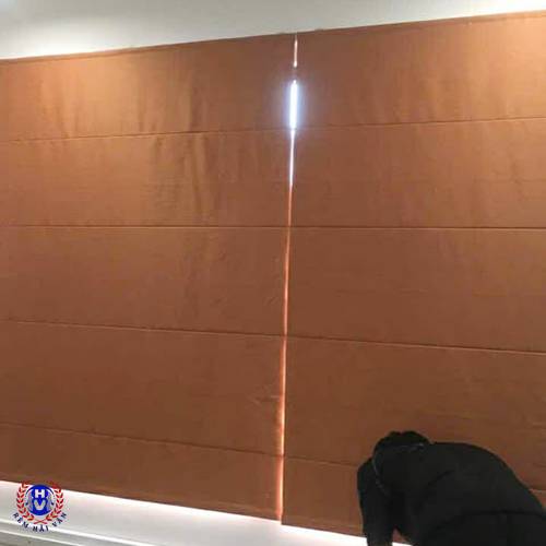 rèm roman màu cam chống nắng phòng ngủ